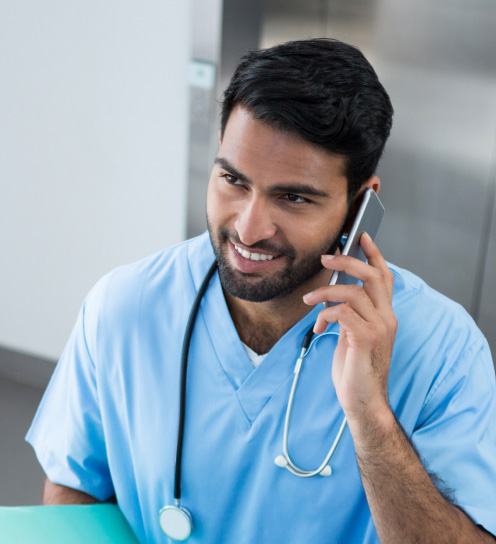 Physician on the phone consulting with a board-certified immunologist and allergy expert